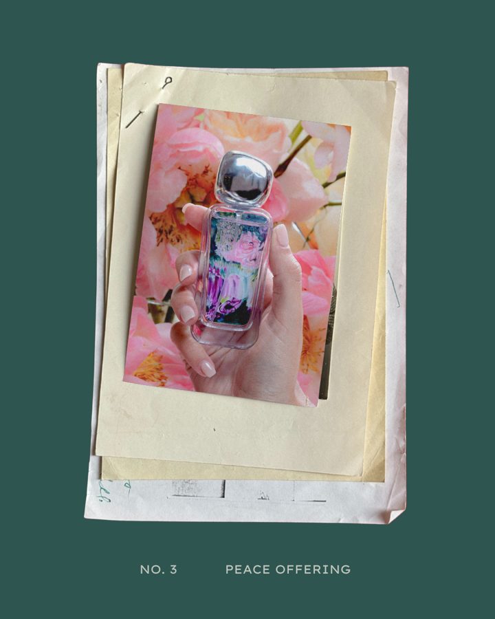 Peace Offering bottle on layered paper over a deep green background